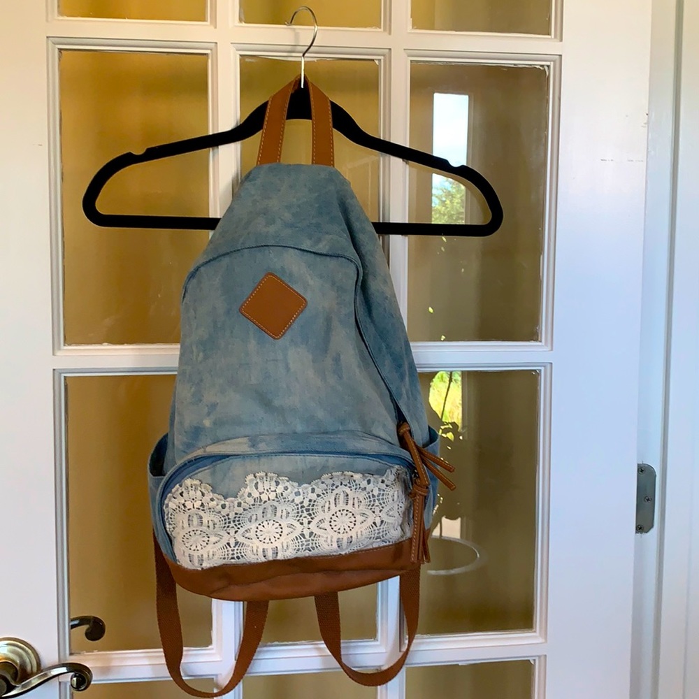 Unique Claire’s book bag. Color Blue Jean. Size M